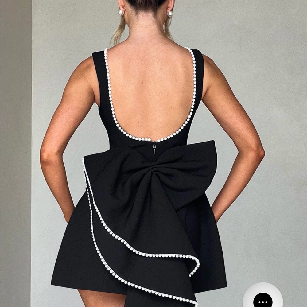 Elegant Black Mini Dress with Pearl Accents
